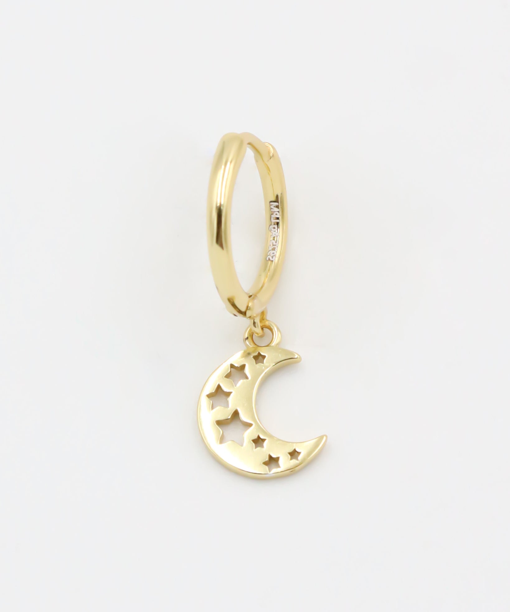 A gold-colored hoop earring with a crescent moon charm attached, set on a white background.