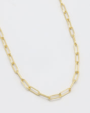 Gold chain necklace on a white background