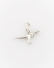 Silver dog pendant on a white background