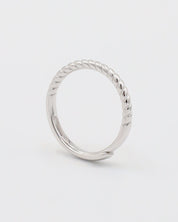 A silver ring with a twisted band design on a white background.