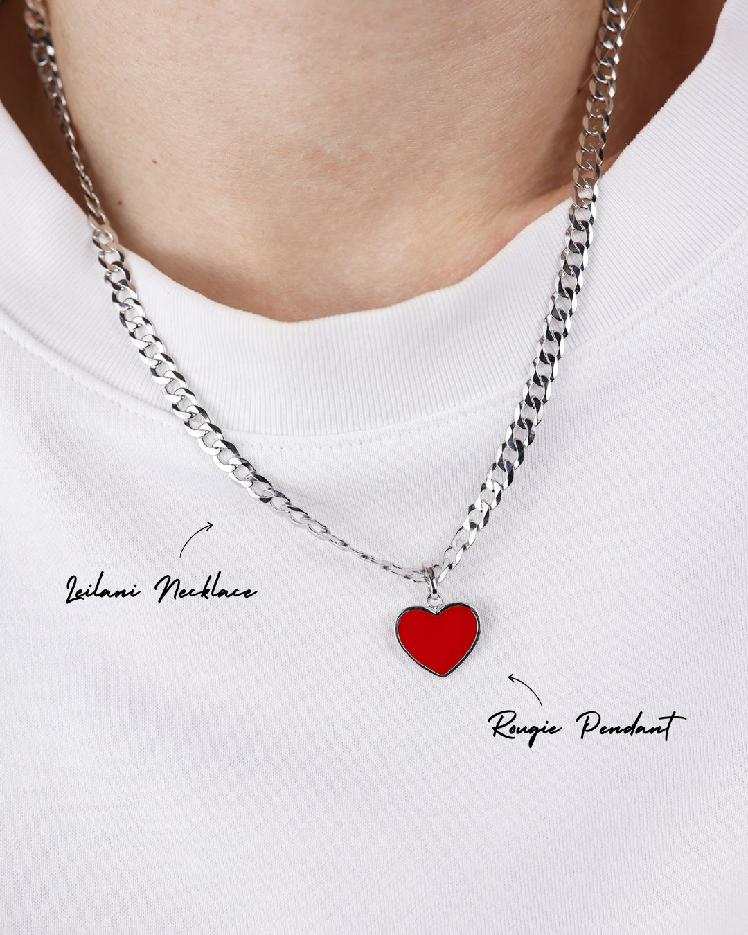 Necklace with a red heart pendant on a white background