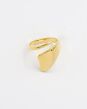 A single gold-colored ring on a white background.