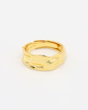 Daphne - adjustable gold-plated sterling silver ring with wavy texture, top view, minimalist design.