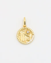 Gold-plated sterling silver Capricorn zodiac pendant with sparkling zirconia stones.