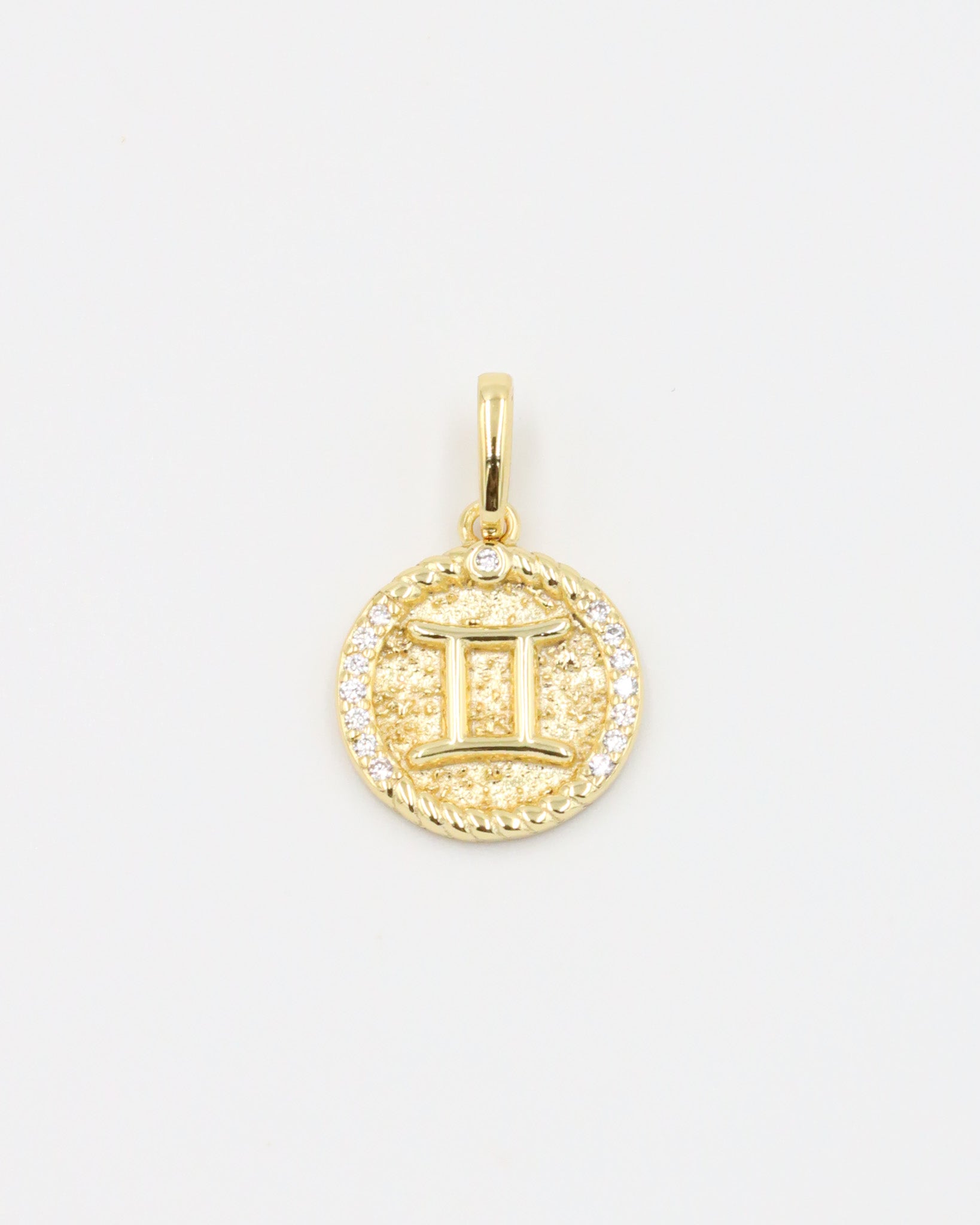 Gold-plated sterling silver Gemini zodiac pendant with sparkling zirconia stones.