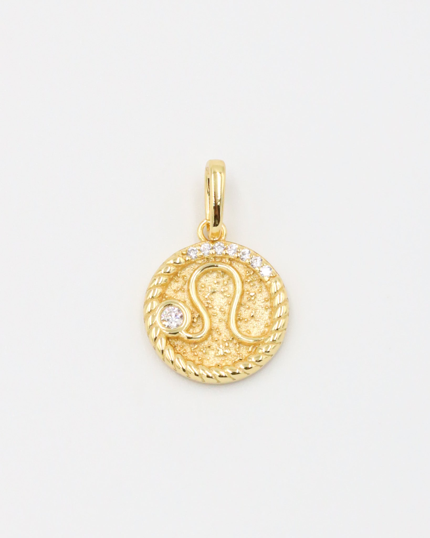 Gold-plated sterling silver Leo zodiac pendant with sparkling zirconia stones.