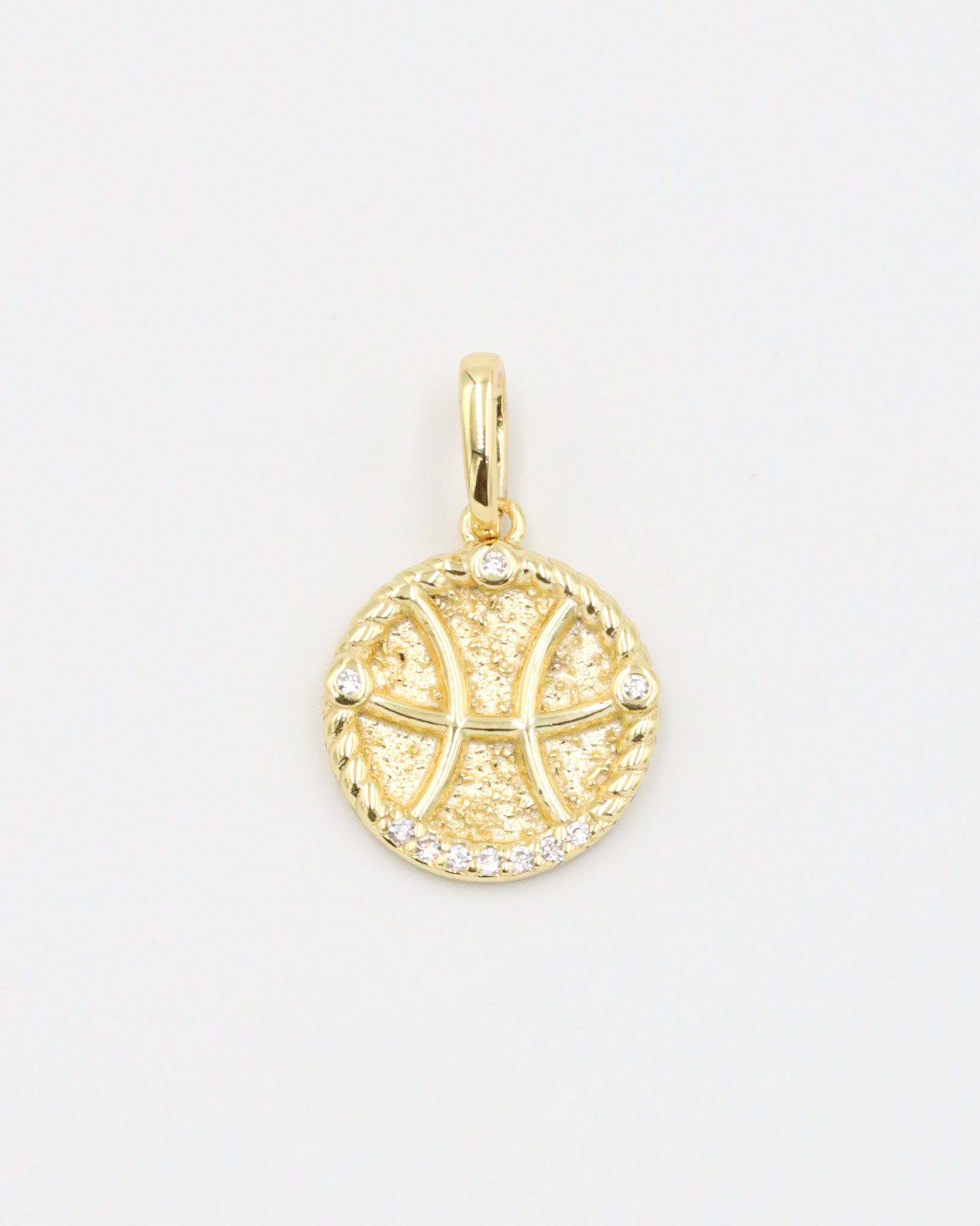 Gold-plated sterling silver Pisces zodiac pendant with sparkling zirconia stones.