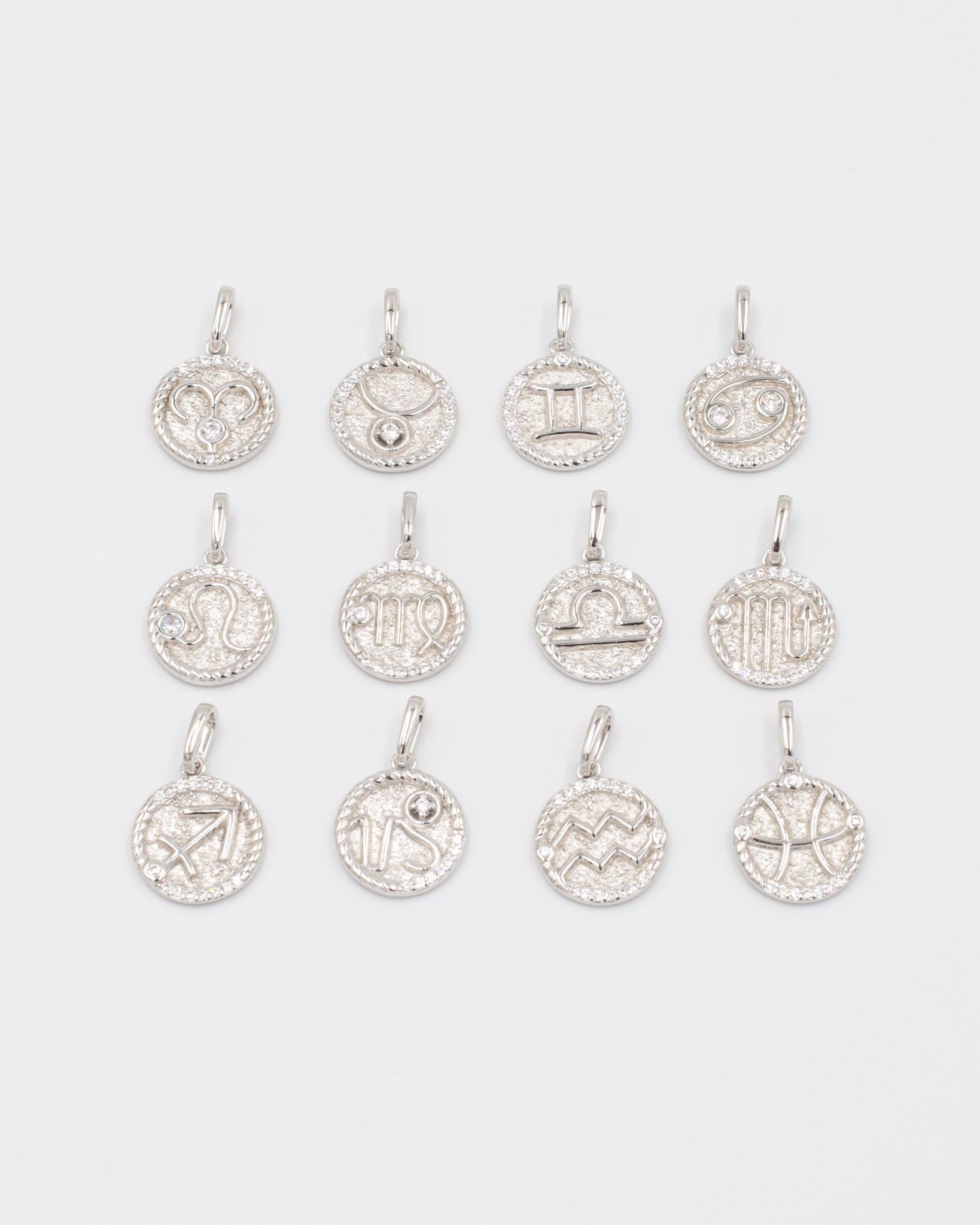 Rhodium Plated 925 Sterling Silver Zodiac Pendants with Zirconia Stones for All 12 Signs.