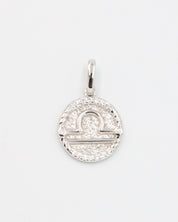Libra zodiac silver pendant in rhodium-plated sterling silver featuring a detailed design and zirconia stones.