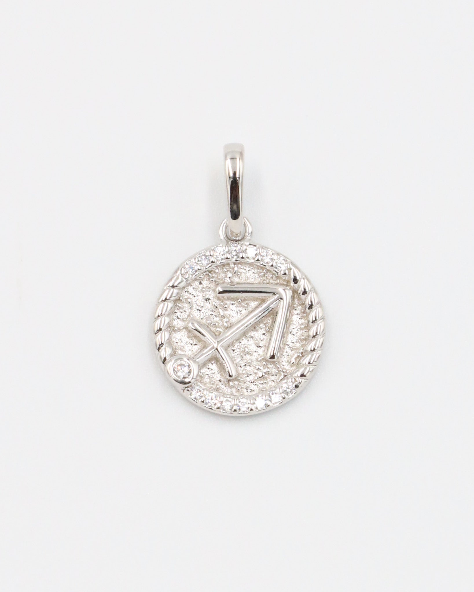 Sagittarius zodiac silver pendant in rhodium-plated sterling silver with zirconia stone.