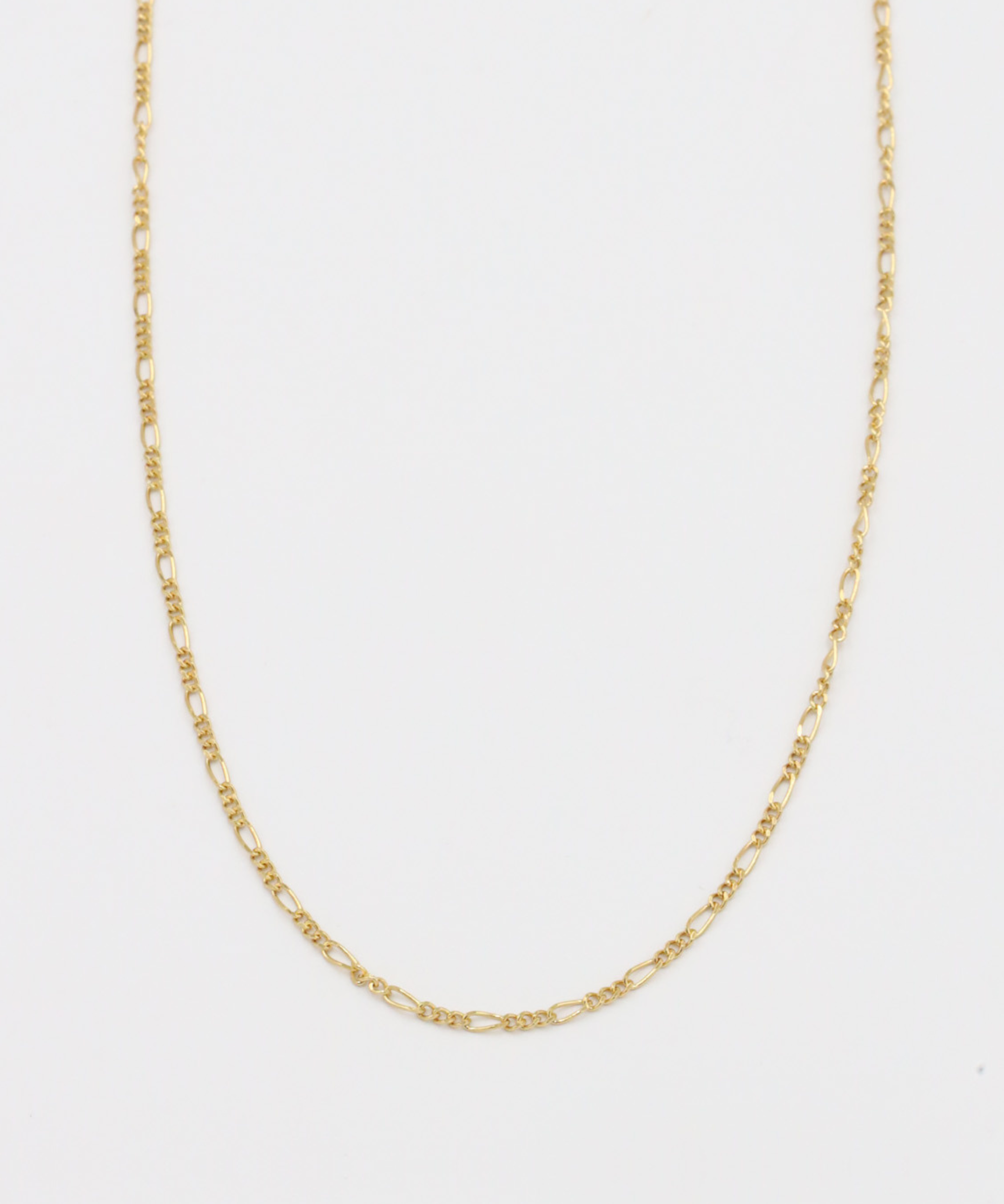 Closeup view of the Annabelle necklace in gold, showcasing its delicate chain design made from gold-plated 925 sterling silver.