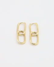 A pair of gold-colored hoop earrings with a hinged clasp, displayed against a white background.