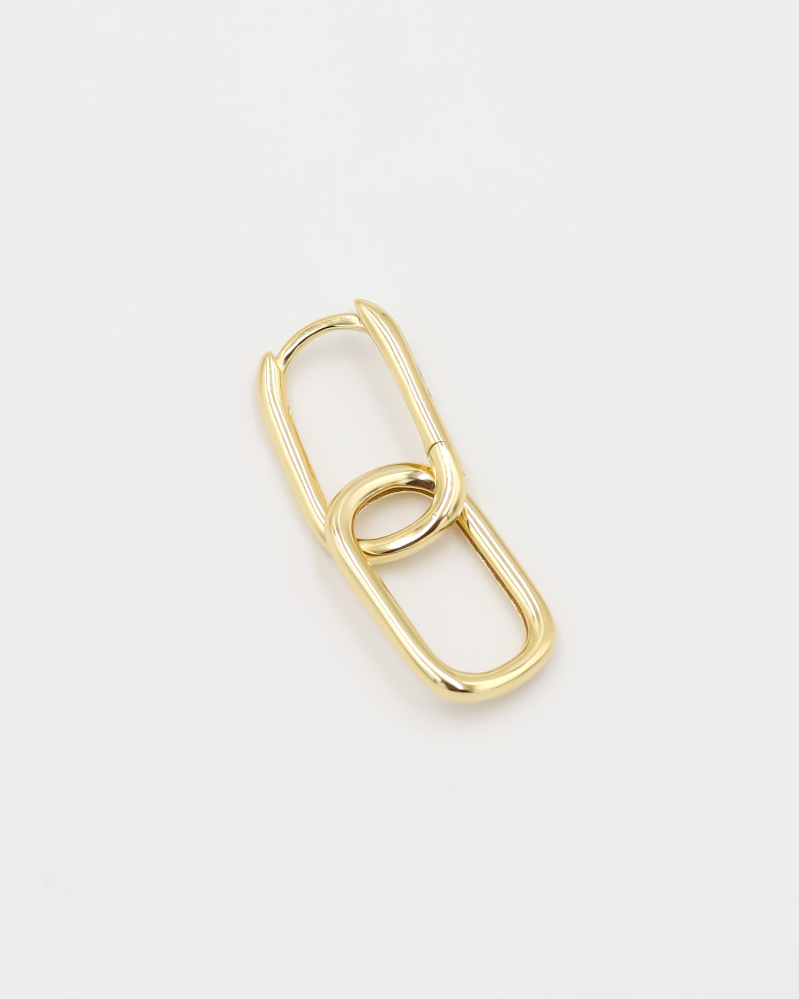 Close-up of a single Adelaide earring by ruru. studios, featuring a modern double-link design in a polished silver finish.