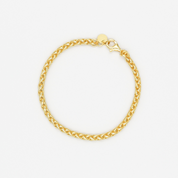 A gold-colored bracelet with a clasp, displayed against a white background.