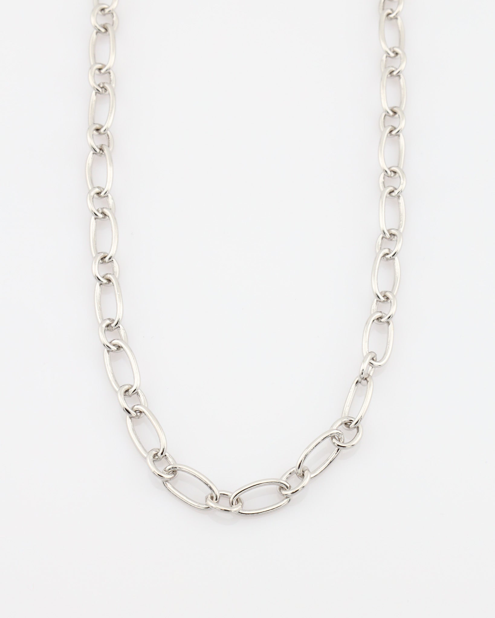 Silver chain necklace on a white background