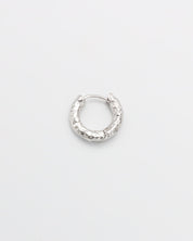 A single silver hoop earring with a hinged clasp, displayed against a white background.
