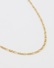 Angled view of the Annabelle necklace in gold, highlighting the fine craftsmanship of its gold-plated 925 sterling silver chain.