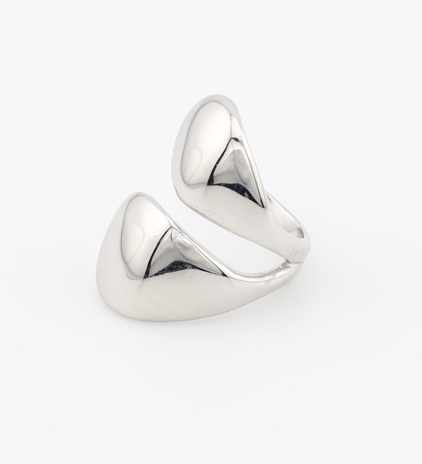 Silver ring with a modern design on a white background