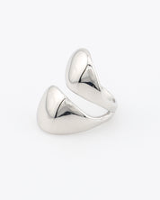 Silver ring with a modern design on a white background