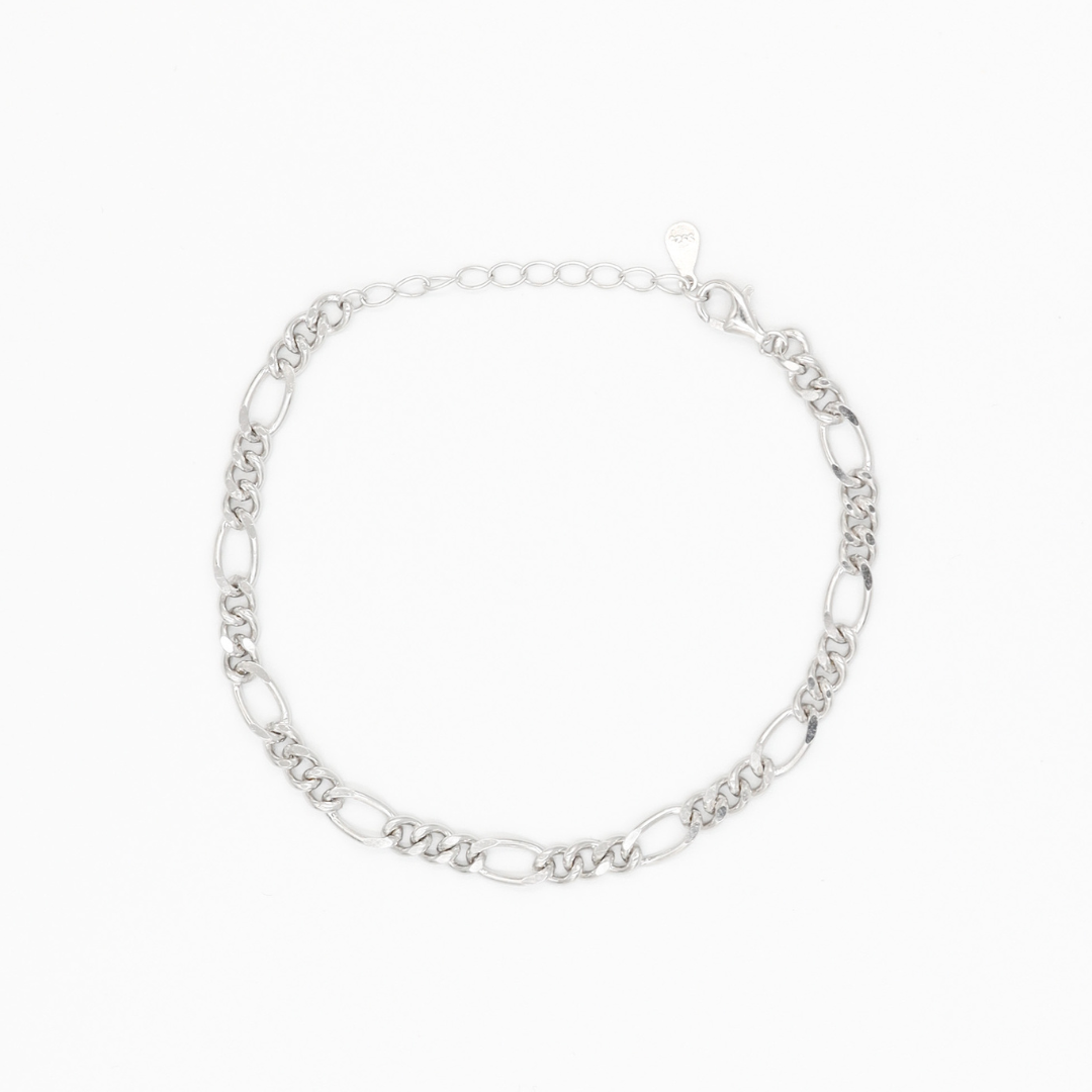 A silver-colored bracelet with a chain-link design, displayed against a white background.