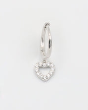 A silver hoop earring with a heart-shaped charm hanging from it, displayed against a white background.
