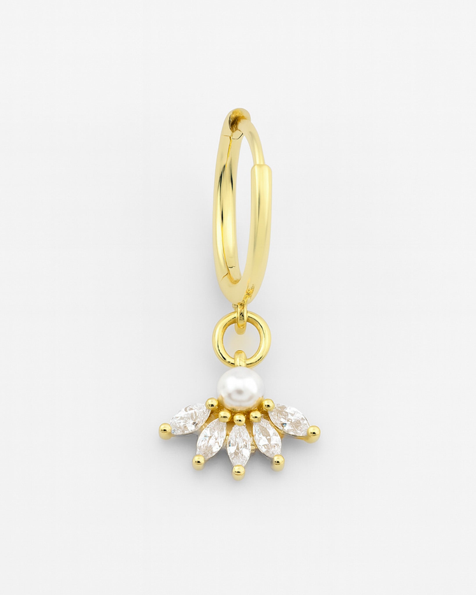 Gold hoop earring with a pearl and diamond-like stone on a white background