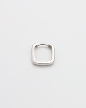 A single silver-colored hoop earrings with a hinged clasp, displayed against a white background.