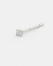 Silver stud earring with a clear gemstone on a white background