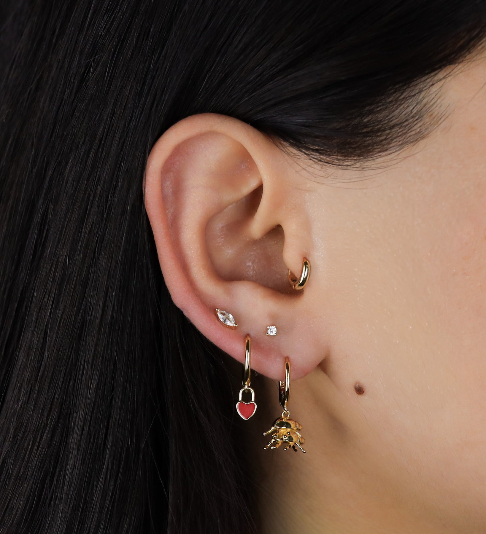 Chafer_Earring_Gold_Worn.jpg