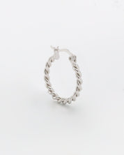 A single silver hoop earring with a twist pattern and latch back clasps on a white background.
