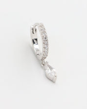 Silver hoop earring with a heart-shaped pendant on a white background