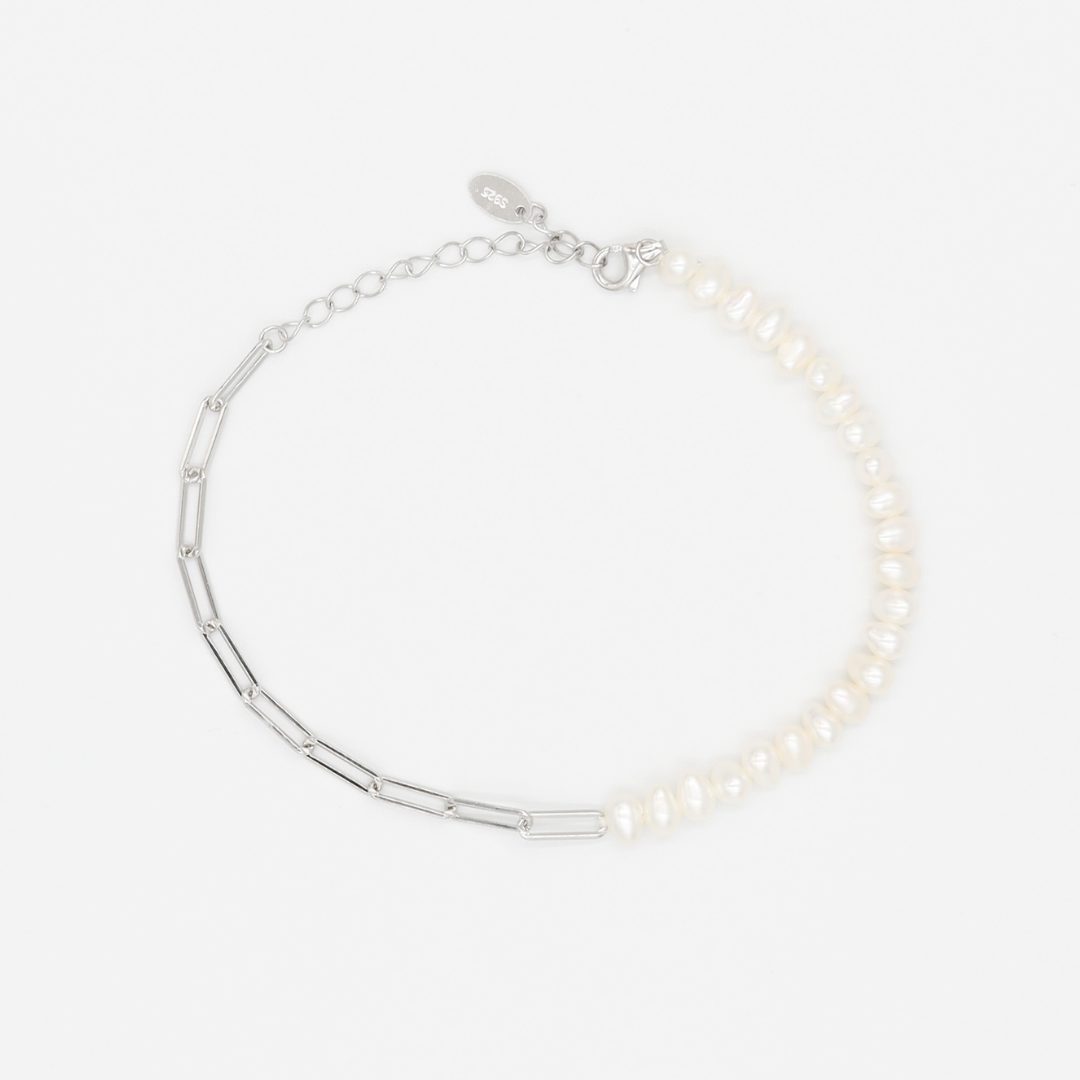 A silver bracelet featuring a combination of pearl beads and chain links, with a focus on the clasp mechanism.