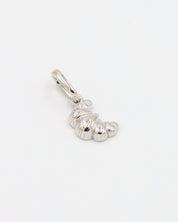 Croissant Silver pendant made from rhodium-plated 925 sterling silver, laid flat to display the details.