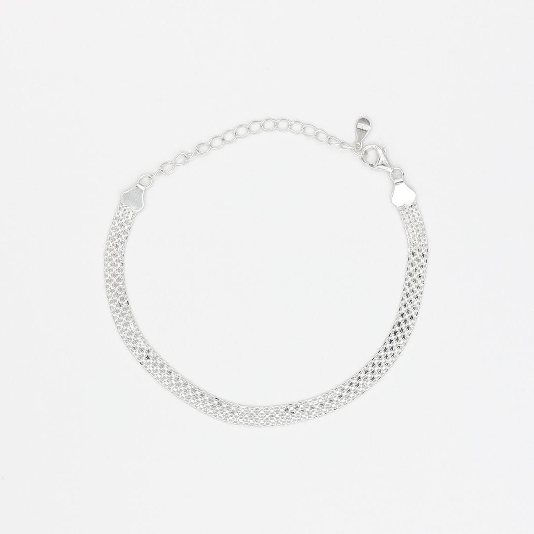 A silver bracelet with a chain link design, featuring a clasp closure.