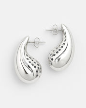 Silver earrings with a unique design on a white background