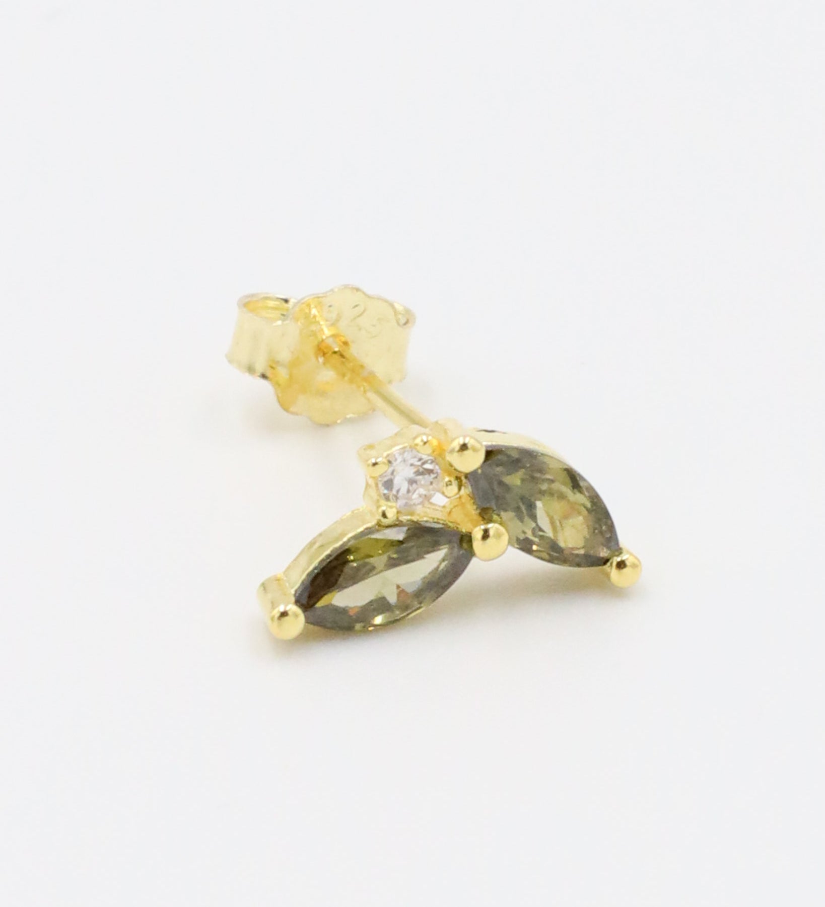 Single left Eliza Olive earring with olive marquise-cut stones and cubic zirconia.