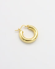 A single gold-plated hoop earring with a latch back closure mechanism, displayed against a white background.