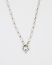 A close-up of the Hunter Necklace in 925 sterling silver featuring an elegant circular clasp on a link chain.