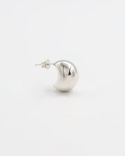 A single silver stud earring with a butterfly closure on a white background.