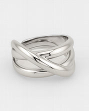 Silver ring with a braided design on a white background
