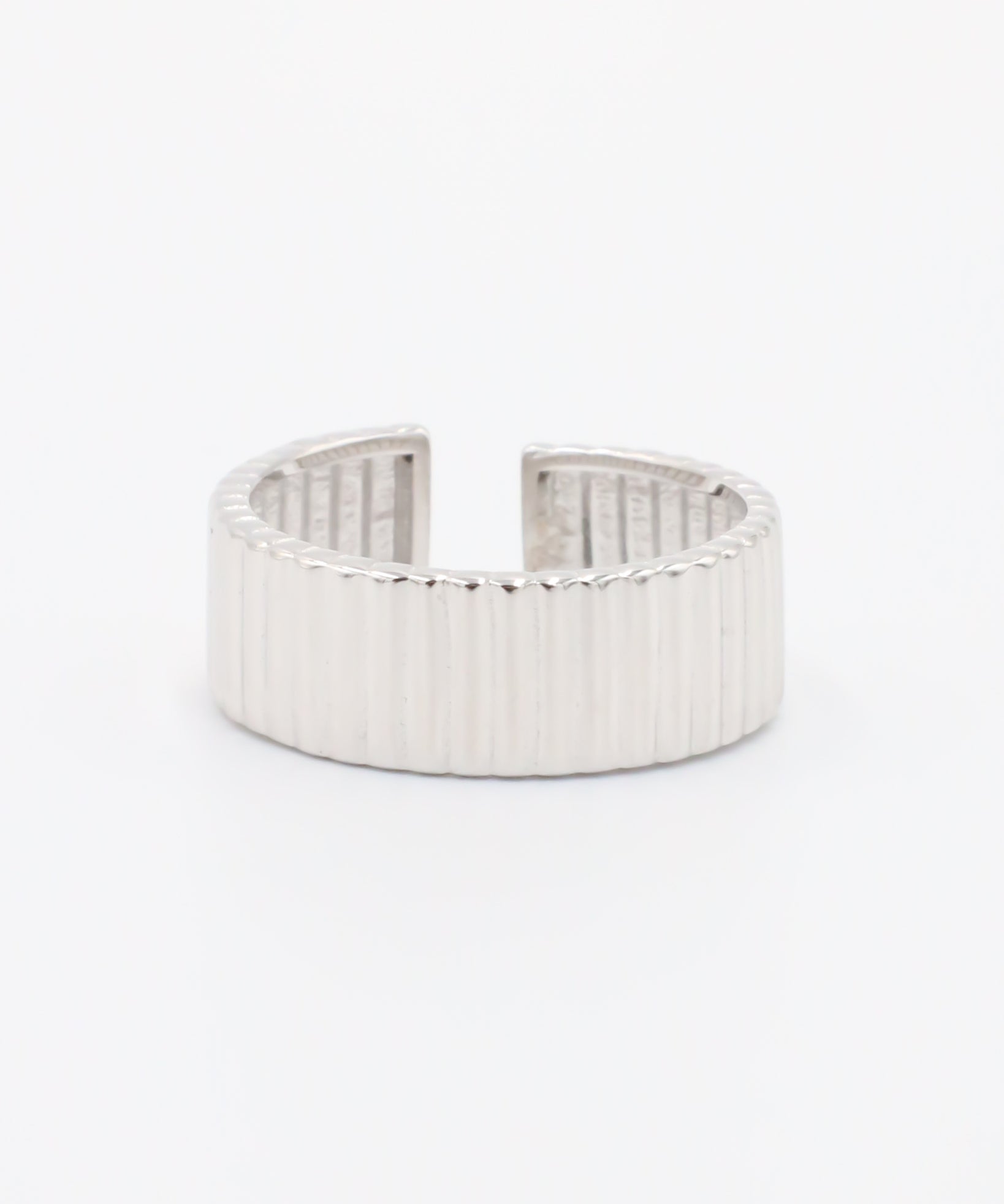 An adjustable sterling silver ring with a textured band, displayed on a white background.