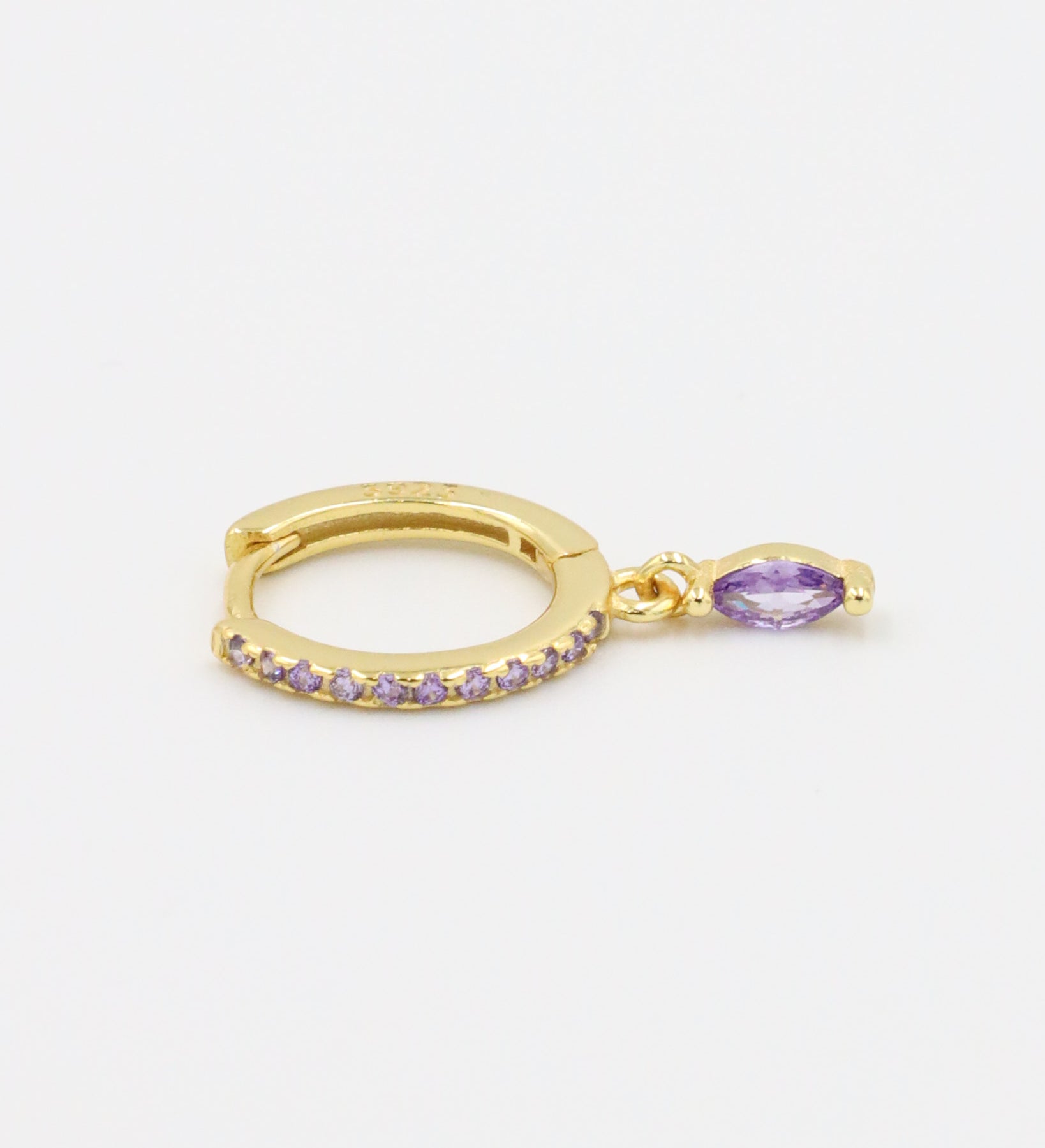 Single Kyiomi Purple earring crafted from gold-plated sterling silver, showcasing small purple zirconia stones along the hoop with a hanging marquise-shaped purple zirconia stone.