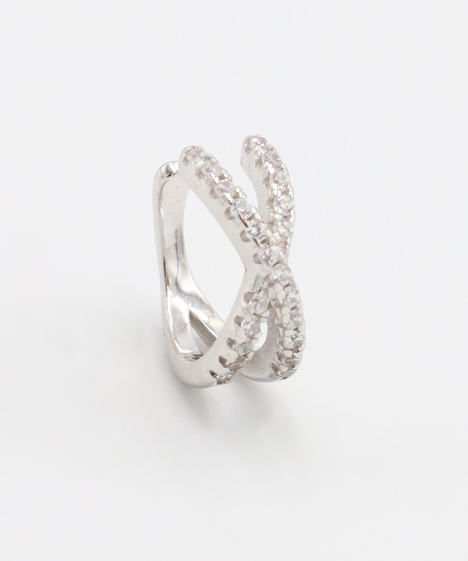 A silver ring featuring a double band design with inset stones.