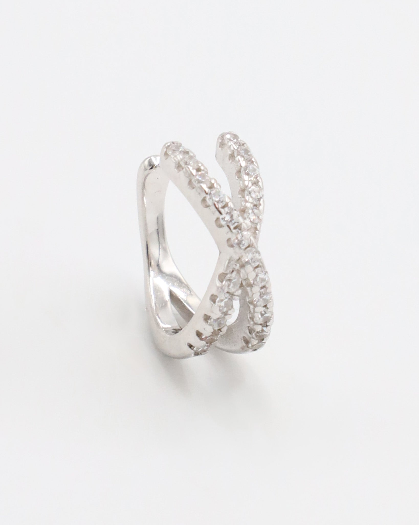 A silver ring featuring a double band design with inset stones.