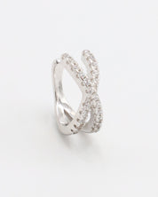 A silver ring featuring a double band design with inset stones.
