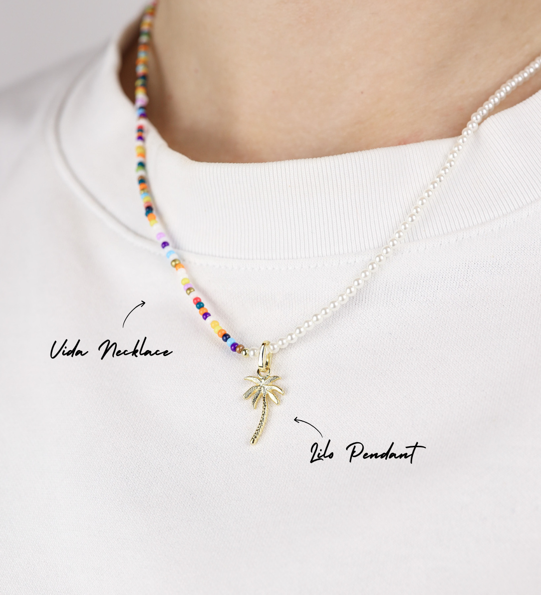 Necklace with a palm tree pendant on a white background