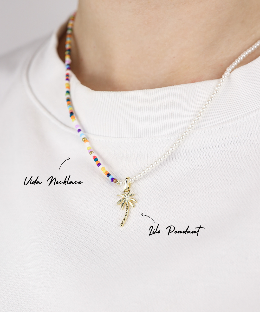 Necklace with a palm tree pendant on a white background