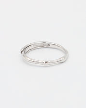 A silver ring on a white background.