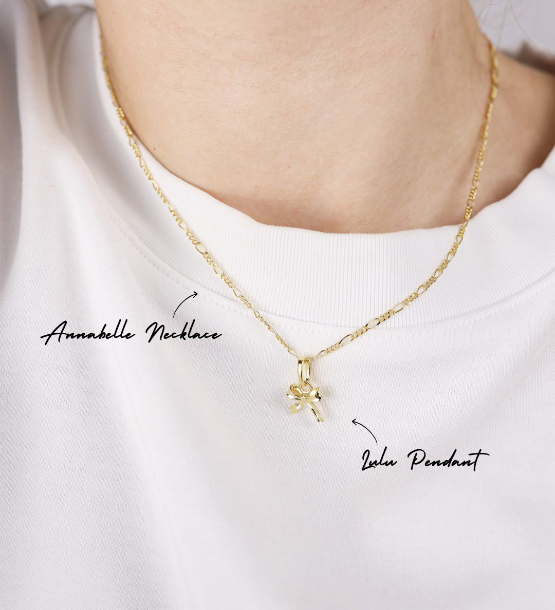 Gold necklace with pendant on a white background