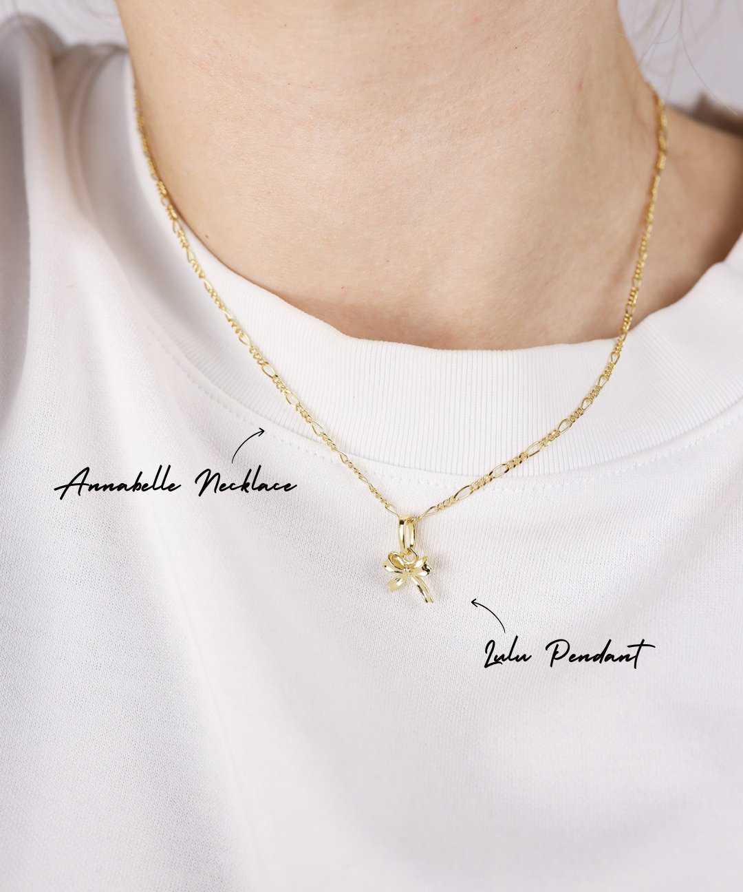 Gold necklace with pendant on a white background